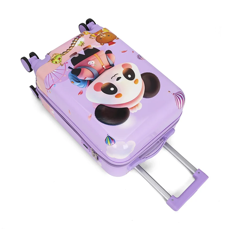 Poignée supérieure et poignée télescopique de la valise violette